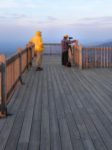 hikers on the observation tower on Cannon Mountain in New Hampshire