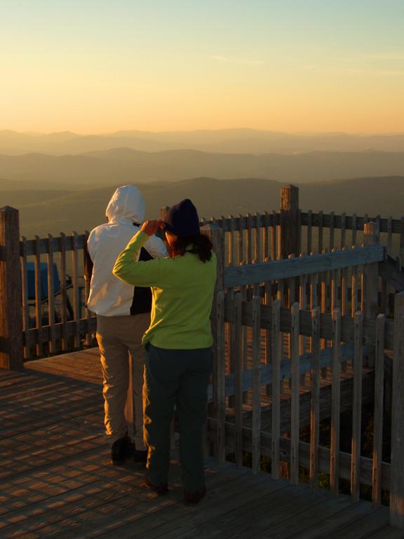 Jadwiga and Marianne on Cannon Mountain at sunset in New Hampshire
