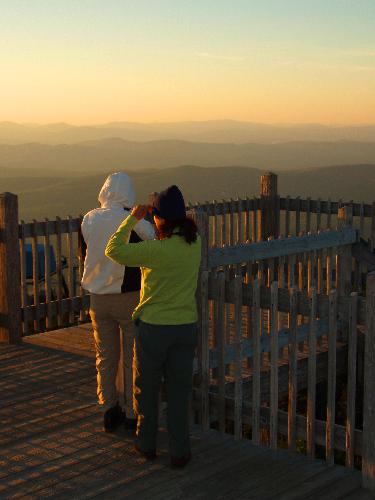 hikers on Cannon Mountain observation tower in New Hampshire