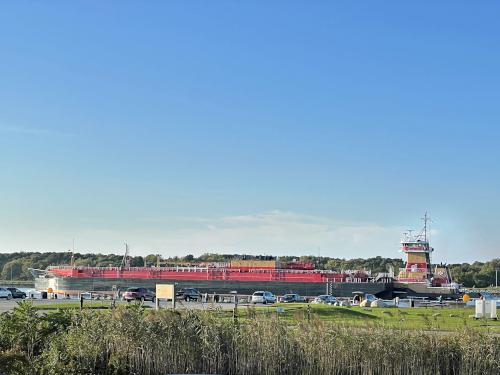 cargo ship in October beside the Cape Cod Canal Bikeway in eastern Massachusetts