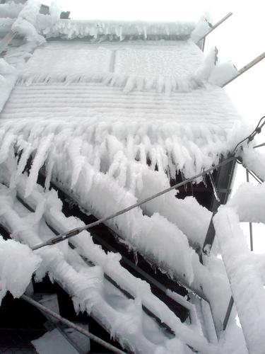 rime ice coats the fire tower atop Mount Cardigan in New Hampshire