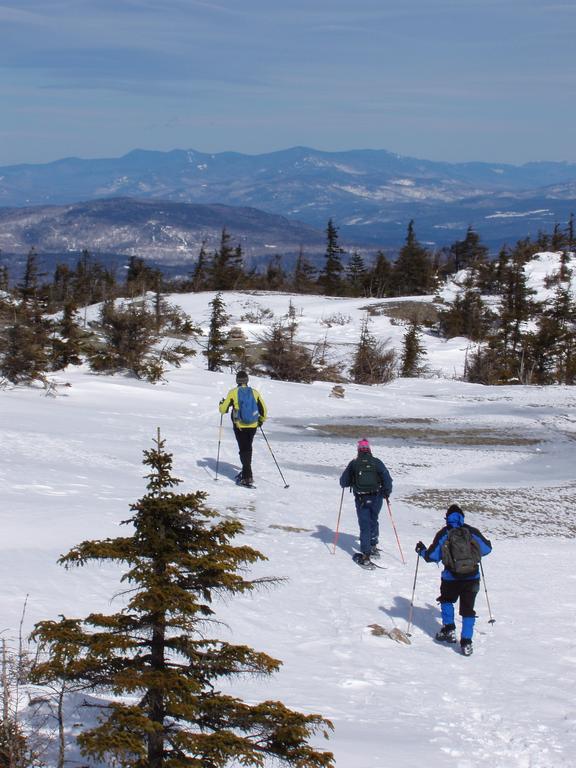 Dick, Kate and Dave head down the open ledges of Firescrew Mountain in New Hampshire