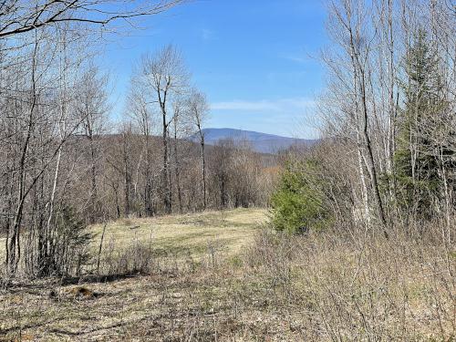 view in May from Kimball Hill Road on the way to Catalouchee Mountain North in New Hampshire