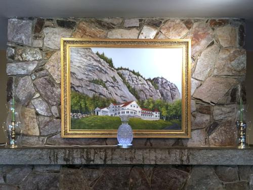painting of the White Mountain Hotel beneath White Horse Ledge at Echo Lake State Park in New Hampshire