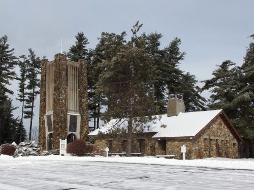 Women's Memorial Bell Tower and Hilltop House in February at Cathedral of the Pines near Rindge in southern New Hampshire