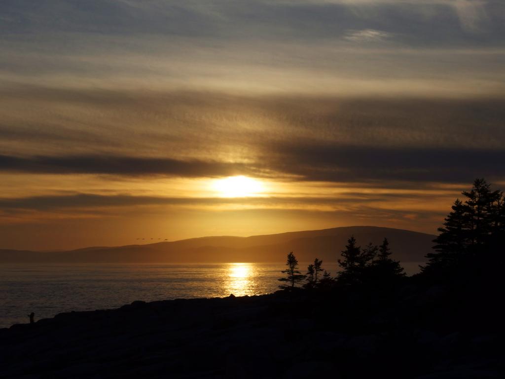 sunset over Champlain Mountain (left) and Cadillac Mountain (tallest) in Acadia National Park as seen from Schoodic Point