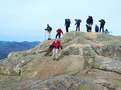hiker group on the summit of Mount Chocorua in New Hampshire