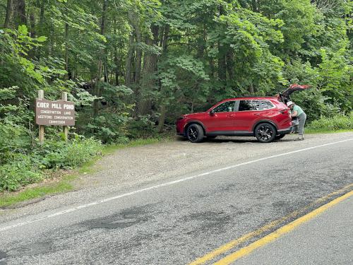 parking in July on the Cider Mill Pond trail at Westford in northeast MA