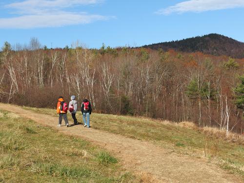 hikers in November on the Gregg Trail to Crotched Mountain in New Hampshire