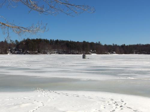 fishing hut in February on Onway Lake at Dearborn Forest in southern New Hampshire