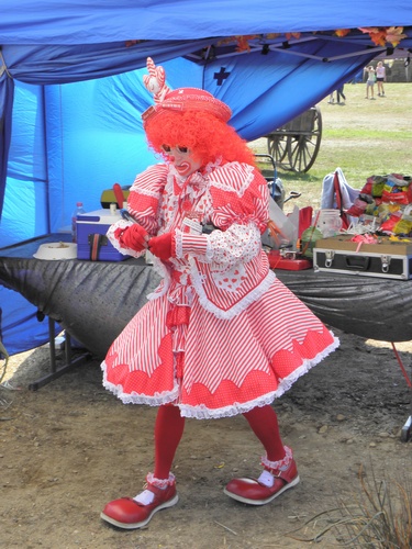 a colorful clown at Deerfield Fair in New Hampshire