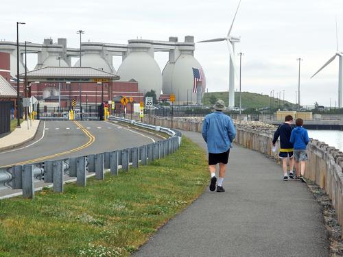 Lance, Ryzek and Carl approach the ultra-modern wastewater treatment plant on Deer Island near Boston Harbor in Massachusetts