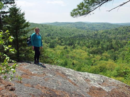 Sarah on a cliff edge at Eagles Nest in southern New Hampshire