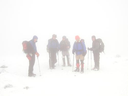hikers in a white-out on the summit of Mount Eisenhower in New Hampshire