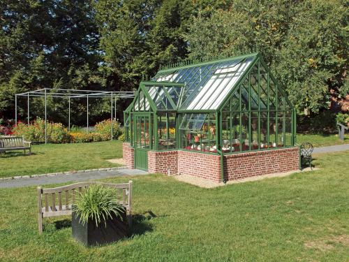 Victorian Greenhouse in September within the garden area at Elm Bank Reservation in eastern MA
