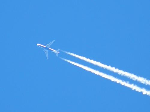 jet plane and contrail