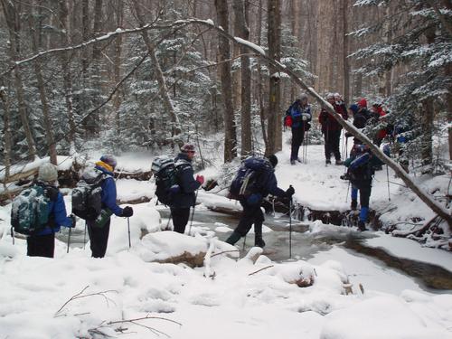 stream crossing in winter on the trail to Mount Field in New Hampshire