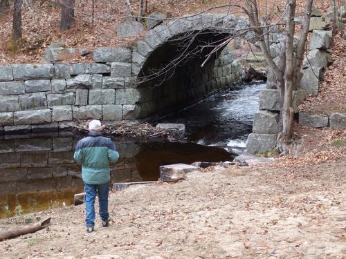 Peter checks out the stone arch bridge over Salmon Brook near Flat Rock Hill at Dunstable in eastern Massachusetts