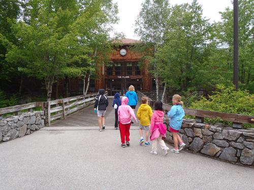 visitors heading toward the Visitor Center at Flume Gorge in New Hampshire