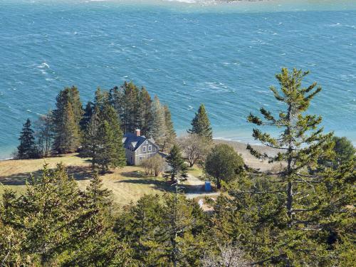 a house on Somes Sound as seen in November from Flying Mountain in Acadia Park, Maine