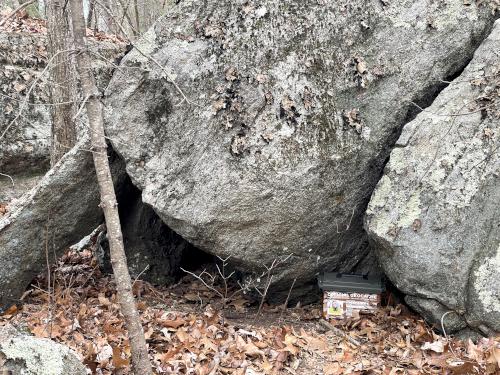 rock with a Geocache stash in November at Forty Caves in eastern Massachusetts