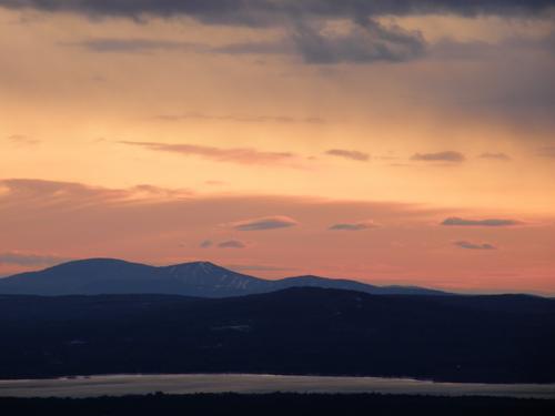 sunset over the Belknap Mountains as seen from Foss Mountain in way eastern New Hampshire