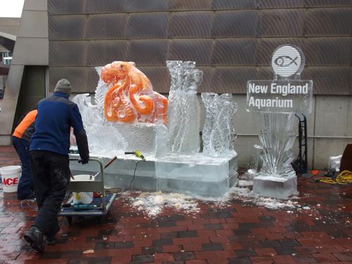 octopus ice sculptors at work in front of New England Aquarium near the Freedom Trail in Boston, MA