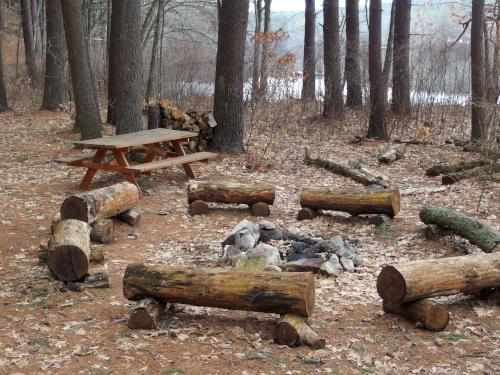 campfire area on the Assabet River at Gardner Hill Conservation Area in Stow, MA
