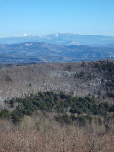 view east toward Franconia Ridge and Mount Moosilauke from the observation tower on Gile Mountain in Vermont