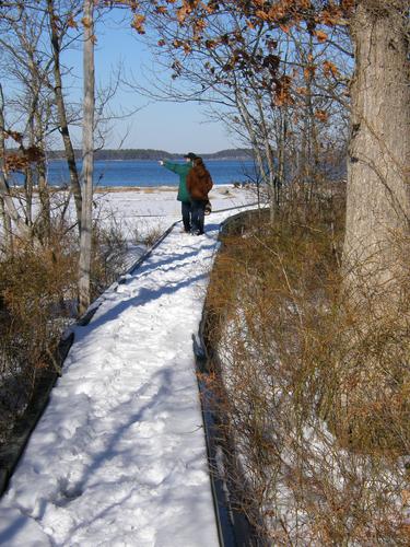 Sandy Point boardwalk in winter at Great Bay NERR in New Hampshire