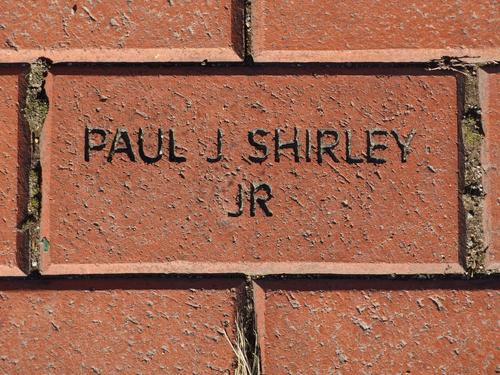 memorial brick on a pathway within Greeley Park at Nashua in New Hampshire