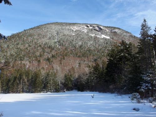 view in December of the shoulder of Mount Kancamagus from Greeley Ponds near Lincoln in central New Hampshire