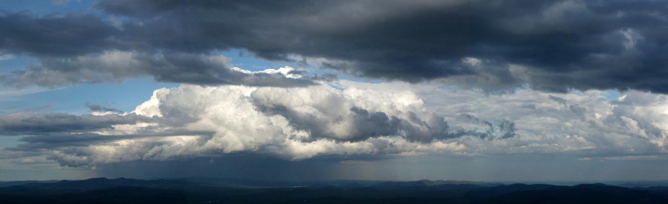 panoramic view of a nearby storm cloud as seen from Green Mountain in eastern New Hampshire
