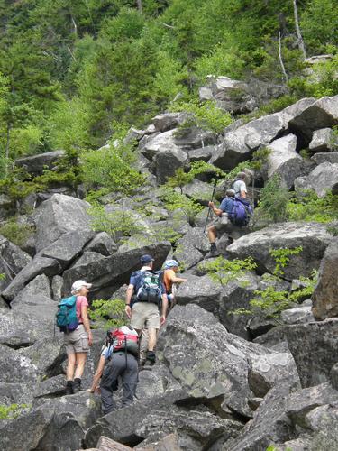hikers climbing Ice Gulch in New Hampshire