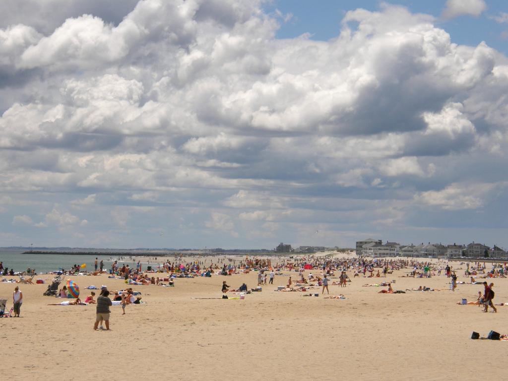 summer vacationers on a fine June day at Hampton Beach in New Hampshire