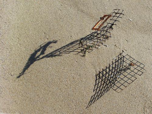 lobster trap in the sand at Hampton Beach in New Hampshire