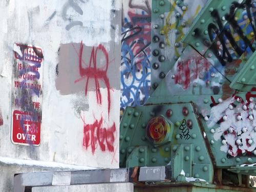 graffiti on the understructure of Route 3 as it passes over the Heritage Trail at Manchester in southern New Hampshire