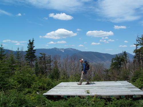 Keith walks the helicopter landing pad on top of Mount Hitchcock North in May in New Hampshire