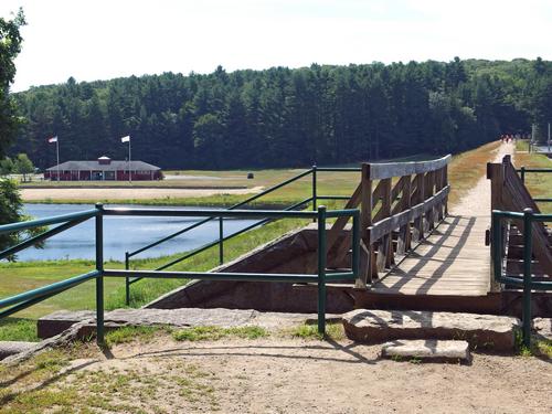reservoir dam, sluiceway and beach at Hopkinton State Park in eastern Massachusetts