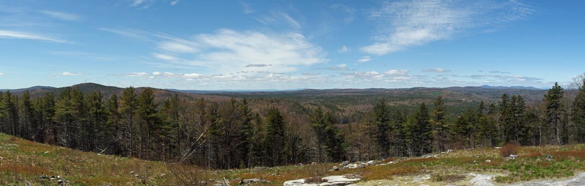 panoramic view northwest from a summit ledge on Hussey Mountain in New Hampshire