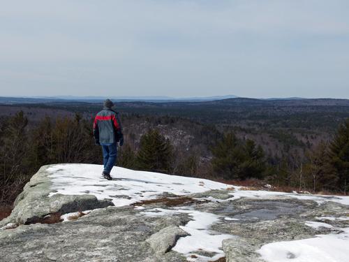 Lance stands out in April on the wide-open summit of Hussey Mountain in New Hampshire