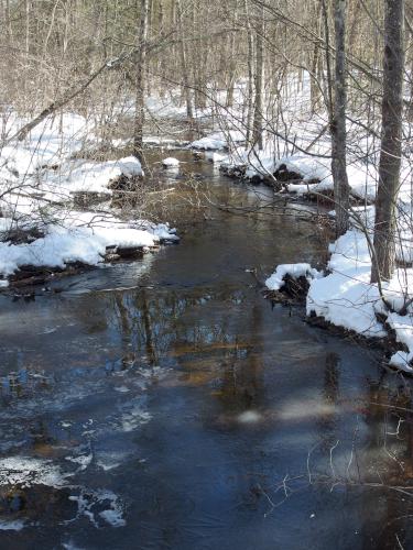Burnham Brook in March at Hutchins Forest in New Hampshire
