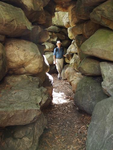 visitor inside the rockery of Ipswich River Wildlife Sanctuary at Topsfield in Massachusetts