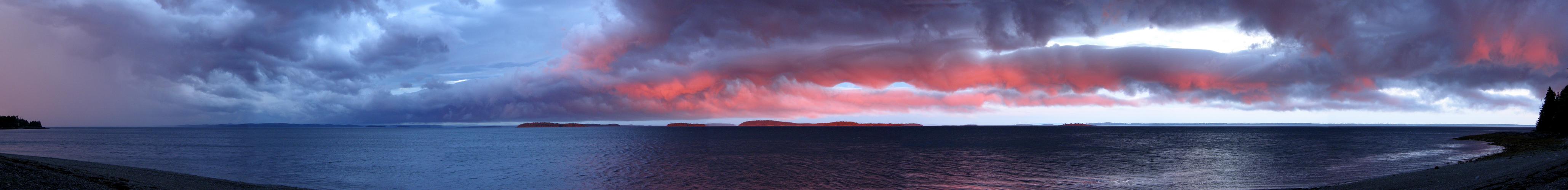 sunset panorama across East Penobscot Bay as seen from Islesboro Island in Maine