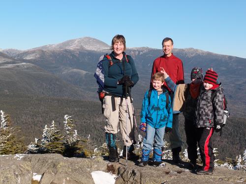 hikers at the summit of Mount Jackson in New Hampshire