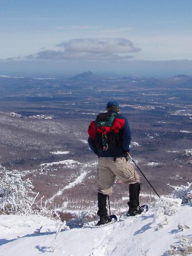 Len looks east from the top of a ski trail near the summit of Jay Peak in northern Vermont