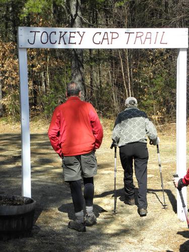 hikers at the trailhead to Jockey Cap in Maine