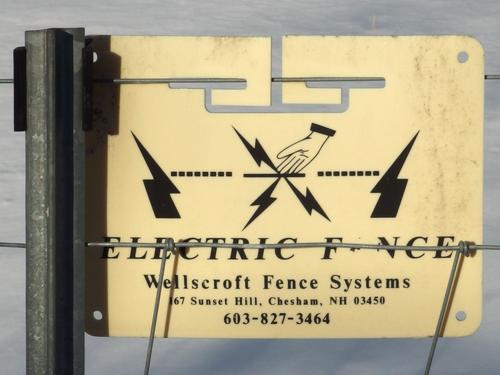 electric fence sign and Joppy Hill Farm in New Hampshire