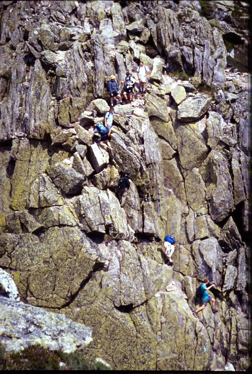 hikers in June on the Knife Edge trail on Mount Katahdin in Maine