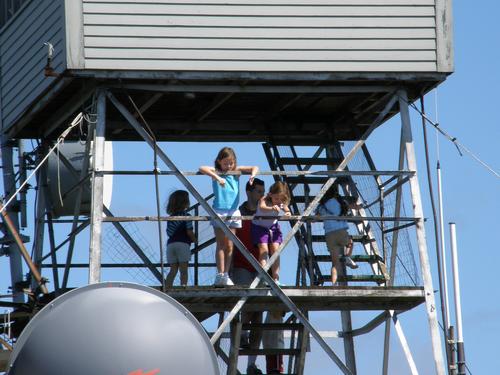 hikers on the Mount Kearsarge fire tower in New Hampshire